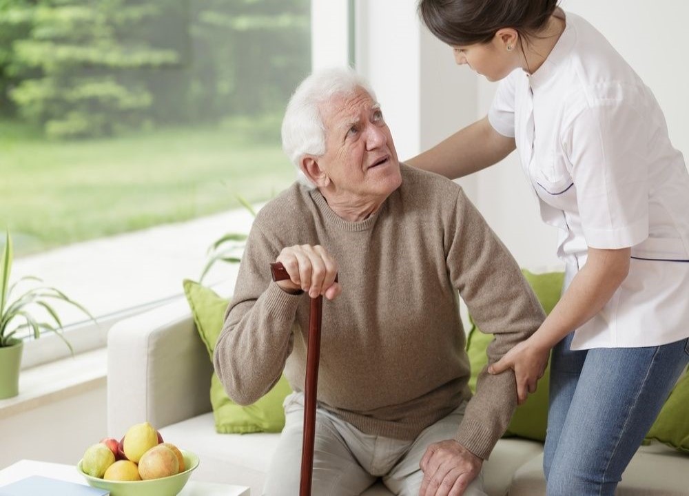 Elderly patient with helper