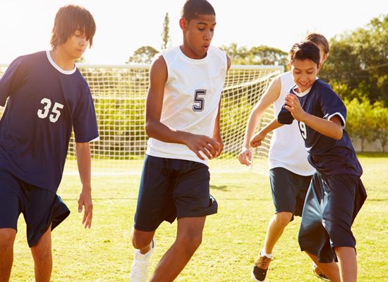 Young boys playing soccer