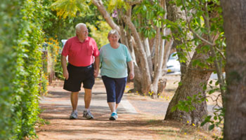 overweight couple walking