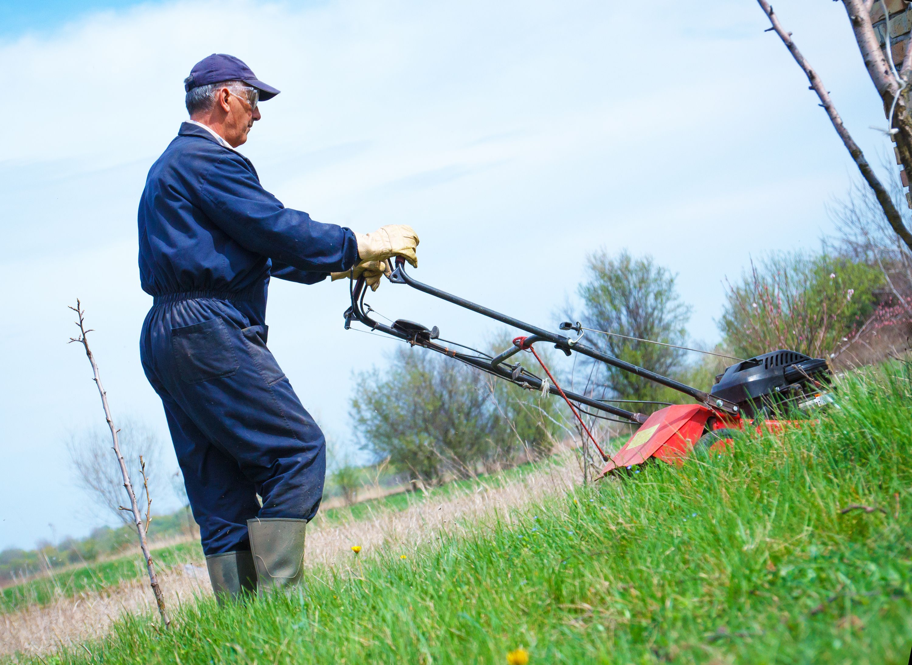 man mowing lawn