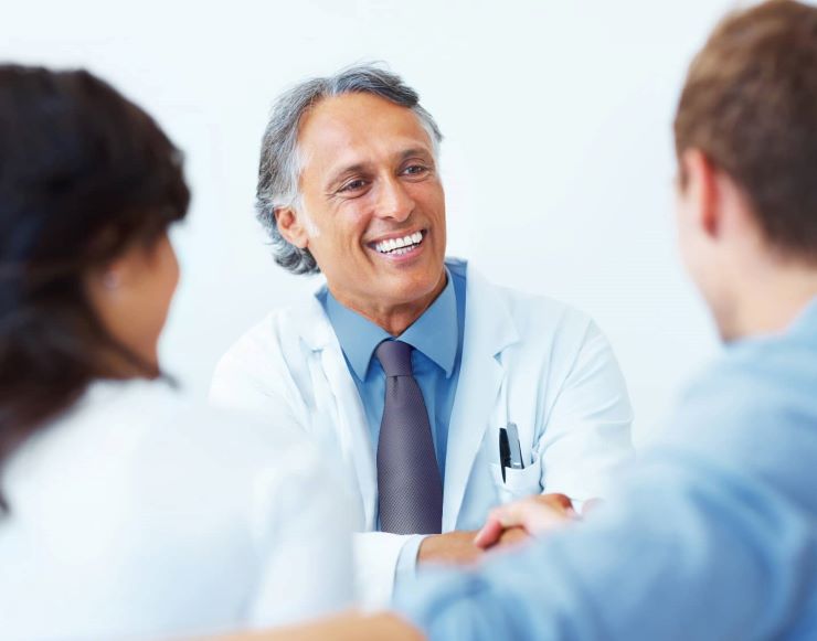 Orthopaedic surgeon greets new patients